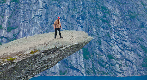 Famous norwegian rock hiking place - trolltunga, trolls tongue, Norway norway, nature, trolltunga, fjord, mountain, landscape, oslo, tongue, troll, hiking, norge, scandinavia, odda, summer, fjords, norwegian, lake, rock, iceland, reykjavik, ringedalsvatnet, hardanger, scandinavian, oslofjord, roldal, sognefjord, beautiful, blue, tourism, nordic, hardangervidda, prekestolen, preikestolen, kjerag, briksdal, Eidfjord, hordalann, Sognefjord, Hardangerfjord, Lysefjord, Geirangerfjord, Nordfjord, Oslofjord, Fjord Norway, Kjeragbolten, Pulpit Rock, Trollstigen, Voringsfossen, Vibrant, norway, nature, trolltunga, fjord, mountain, landscape, oslo, tongue, troll, hiking, norge, scandinavia, odda, summer, fjords, norwegian, lake, rock, iceland, reykjavik, ringedalsvatnet, hardanger, scandinavian, oslofjord, roldal, sognefjord, beautiful, blue, tourism, nordic, hardangervidda, prekestolen, preikestolen, kjerag, briksdal, Eidfjord, hordalann, Sognefjord, Hardangerfjord, Lysefjord, Geirangerfjord, Nordfjord, Oslofjord, Fjord Norway, Kjeragbolten, Pulpit Rock, Trollstigen, Voringsfossen, Vibrant, norway lysefjorden fjord norwegian currency stock pictures, royalty-free photos & images