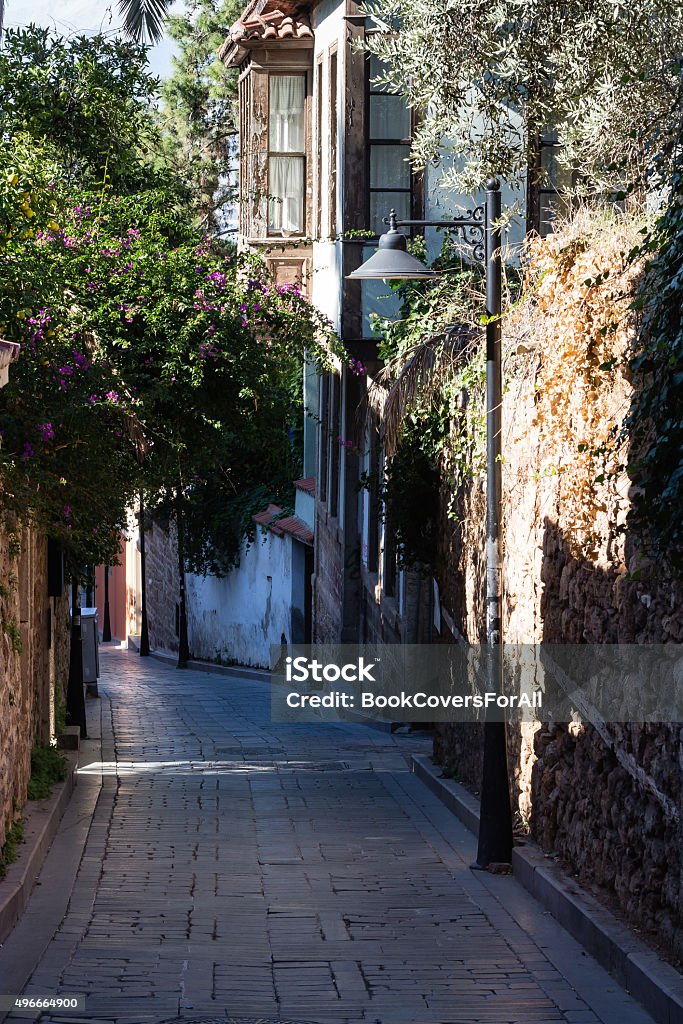 Old town street, early morning. A narrow street in Kaleici, Old Town Antalya. 2015 Stock Photo