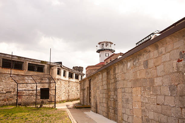 istock Prison Yard and Guard Towen 496664917