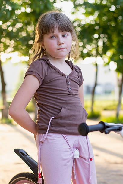 istock little girl on a bicycle 496664927