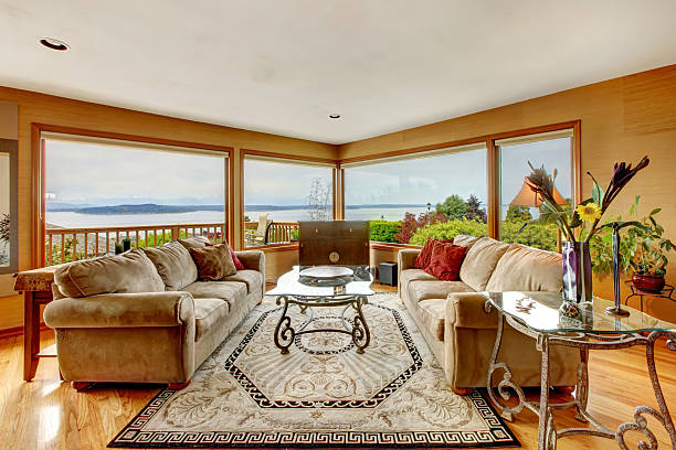 istock Beautiful living room with water view 496665649