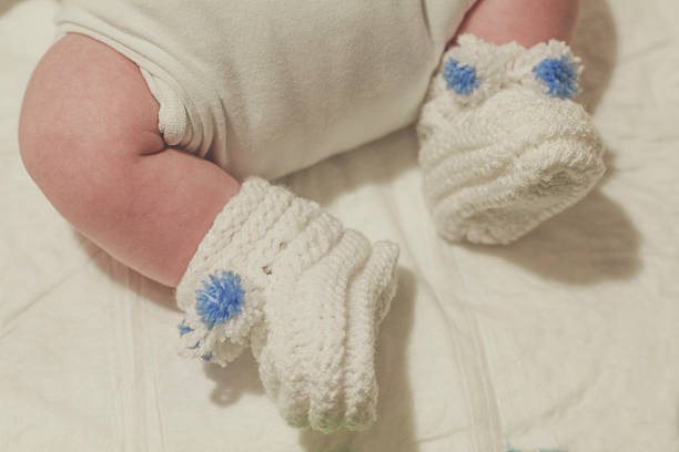 Newborn baby's feet stock photo