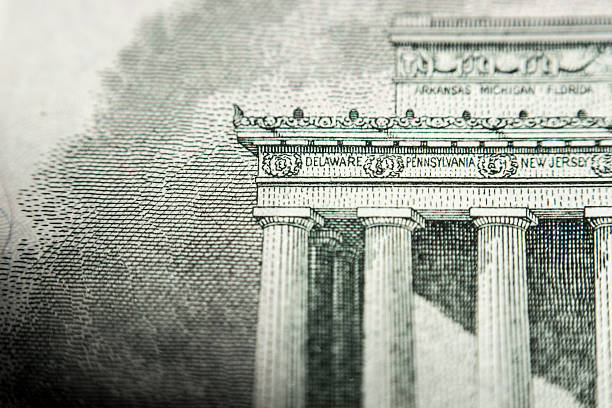 istock five us Dollar bill, super macro, close up photo 496665761