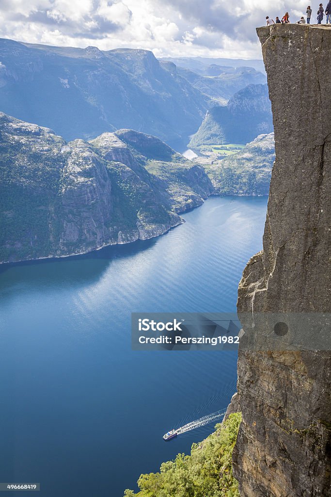 Preikestolen,Pulpit Rock at Lysefjorden (Norway). A well known t Preikestolen,Pulpit Rock at Lysefjorden (Norway). A well known tourist attraction Admiration Stock Photo