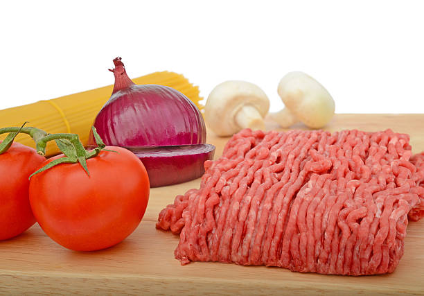 Spaghetti bolognese preparation stock photo