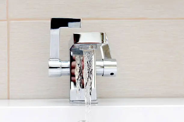 Chromium-plate tap with waterChromium-plate tap with water