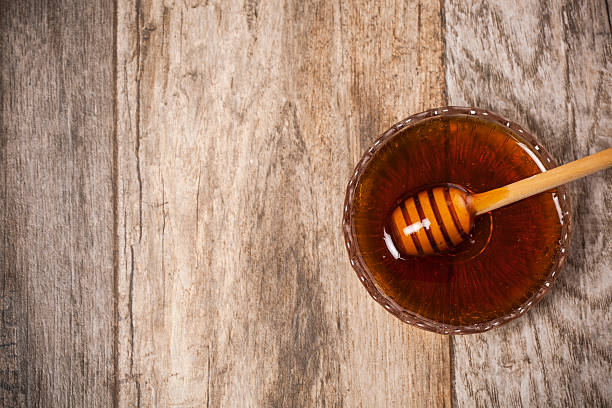 istock Honey with honey dipper 496677734