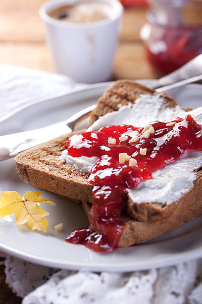 istock Toast with plum jam and cottage cheese 496678590