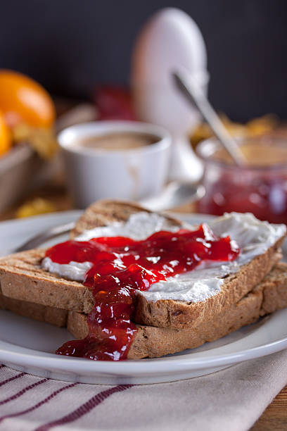 istock Toast with plum jam and cottage cheese 496678666