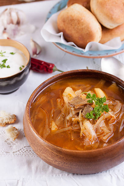 istock Redbeet soup with mushrooms and bread 496678920