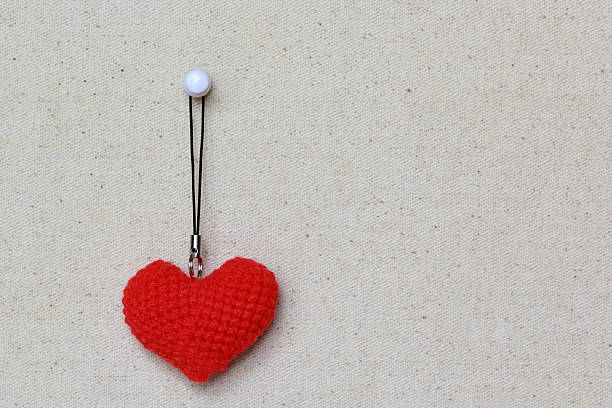istock Handmade crochet red heart shape, valentines day concept 496679394
