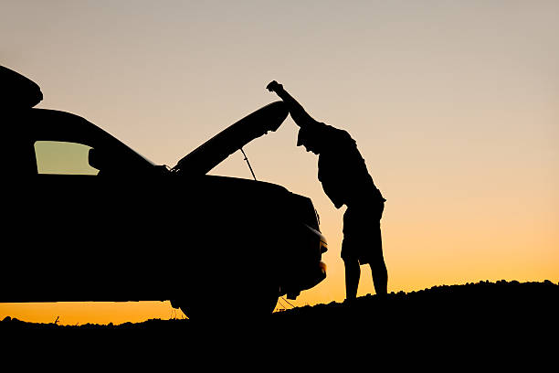 istock Mechanic Examining His Car Trouble 496679437