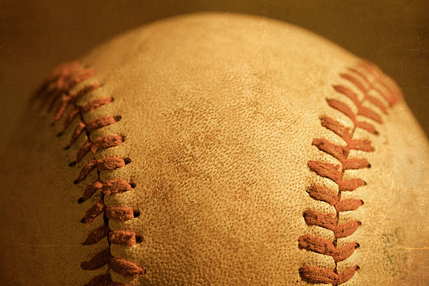 istock Baseball closeup showing stitches and seams 496680015