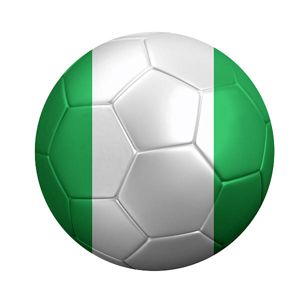 bola de futebol na bandeira da nigéria embrulhado - nigerian flag nigerian culture three dimensional shape nigeria imagens e fotografias de stock