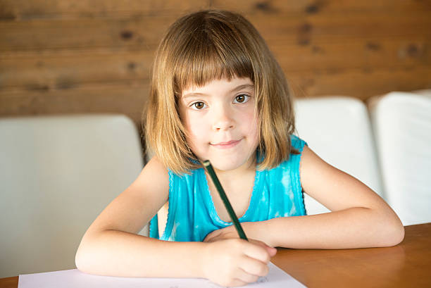istock Little girl drawing 496680701