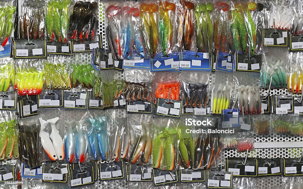 Fishing bait Artificial fishing baits and lures display at pegboard Artificial Stock Photo