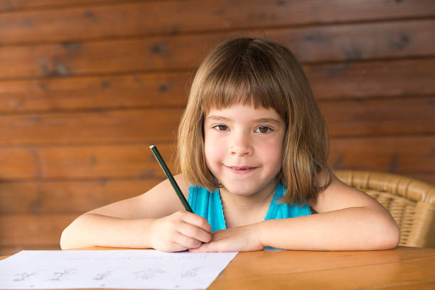 istock Little girl drawing 496681459