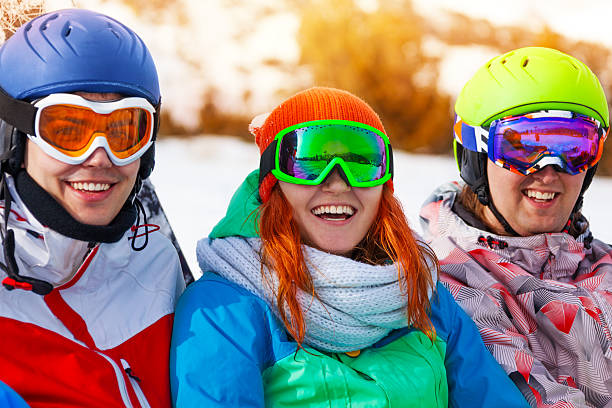 istock Portrait of three smiling mates wearing goggles 496681699