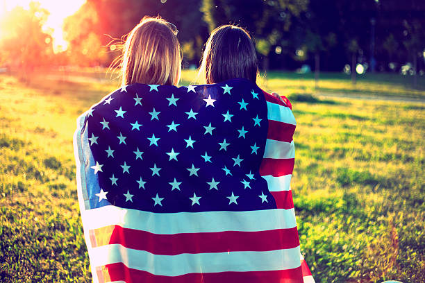 istock Friends wrapped in the American flag 496681737