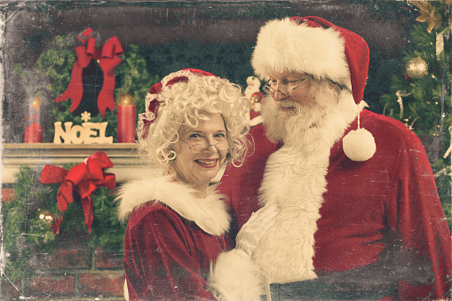 A real authentic Christmas photo of Santa and Ms Claus.