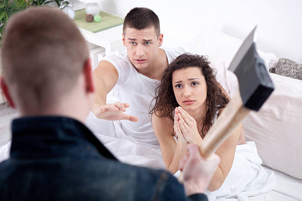 istock angry husband with hatchet caught cheating wife with lover 496682641