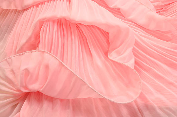 istock Close up on pink pleated lace. 496683054