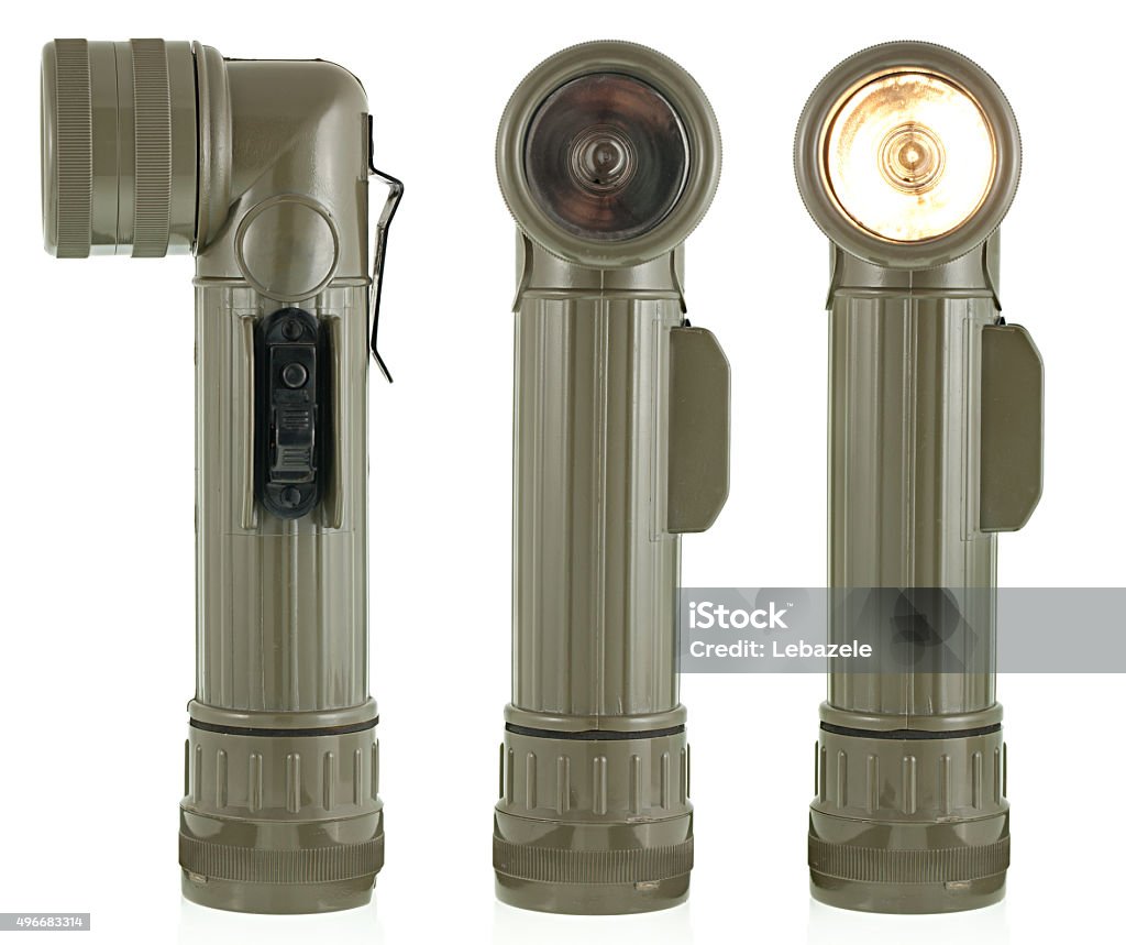 Vintage Flashlight Vintage flashlight. Military old flashlight. One of the symbols of Vietnam War. Flashlight Stock Photo