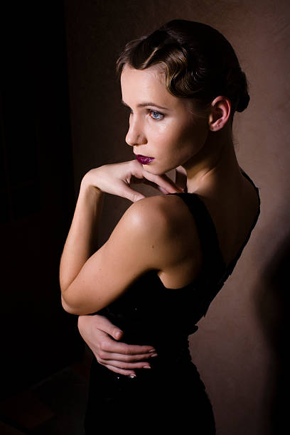 istock beauty blond woman in studio black and white 496683648