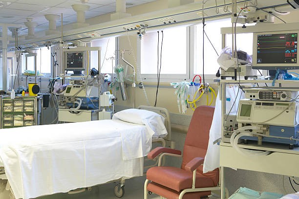 istock Hospital emergency room with bed and equipment 496684479