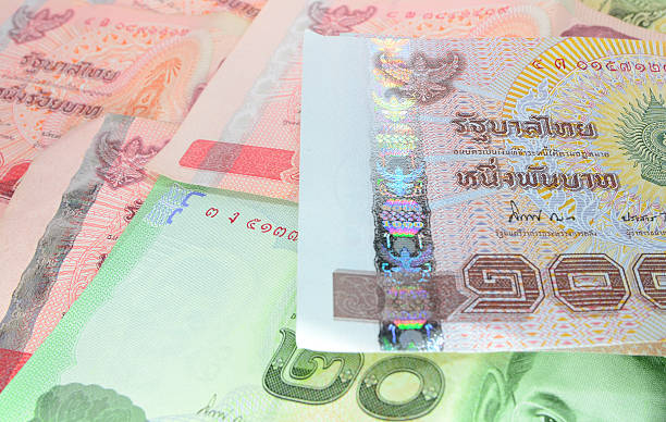 istock Thai money banknotes background 496684639