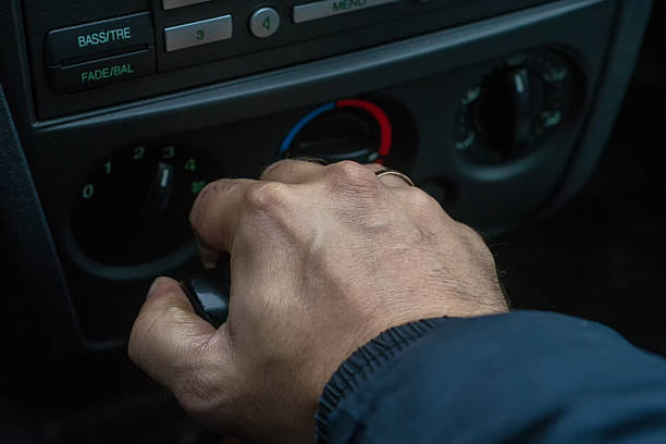 istock Man Changing Gear in an Automatic Car 496685312