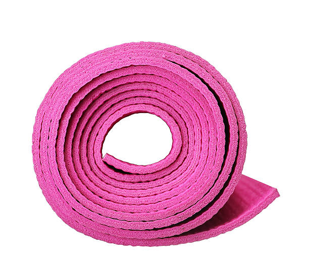 istock Pink Yoga Mat Isolated on white 496685408