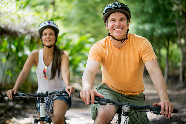 istock Couple mountain biking 496686056