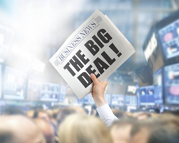 istock Holding Newspaper The Big Deal 496686833