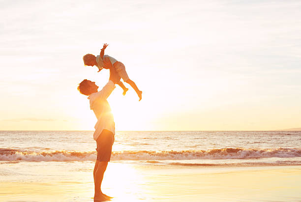 istock Father and Son Playing at Sunset 496687274