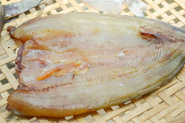 istock dry striped snakehead fish raw food 496687598