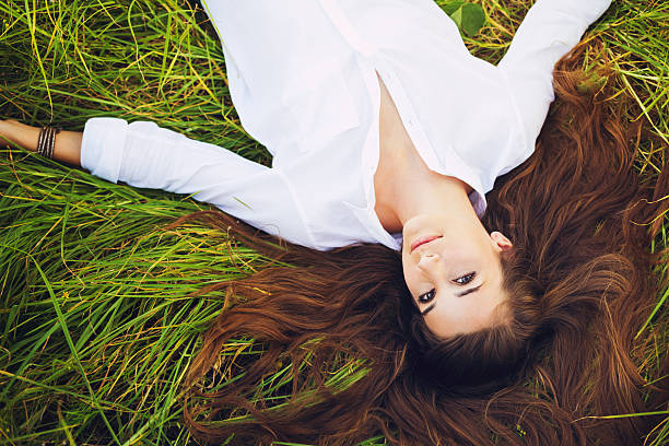 istock Woman Relaxing Outdoors 496689358