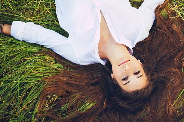 istock Woman Relaxing Outdoors 496689398