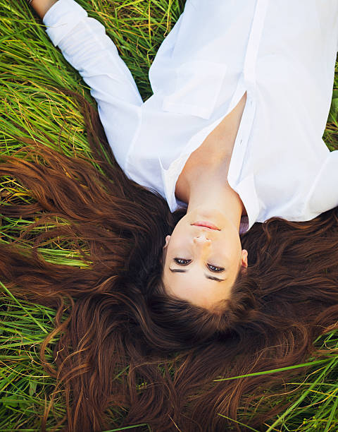 istock Woman Relaxing Outdoors 496689432