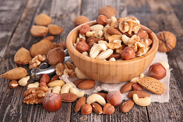 assorted nuts assorted nuts dried fruit stock pictures, royalty-free photos & images