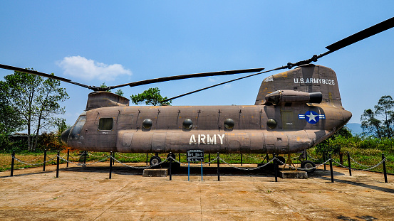 Quang Tri, Vietnam - Apr. 15, 2011: US Army Chinook Helicopter on display at Khe Sanh Combat Base, Quang Tri, Vietnam. The Chinooks' most spectacular mission in Vietnam was the placing of artillery batteries in perilous mountain positions inaccessible by any other means, and then keeping them resupplied with large quantities of ammunition.