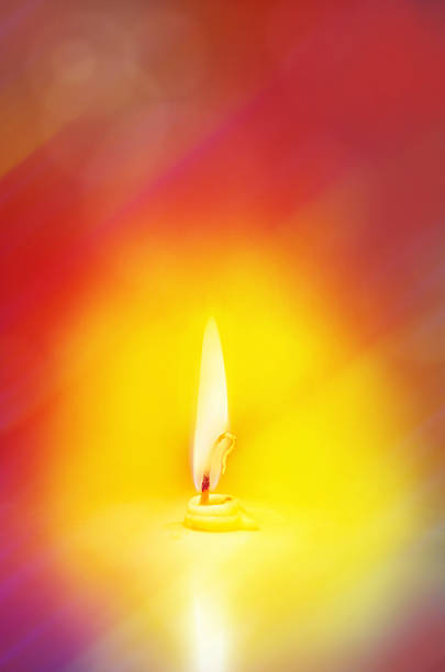istock candle illuminating spreading beautiful warm light 496690188