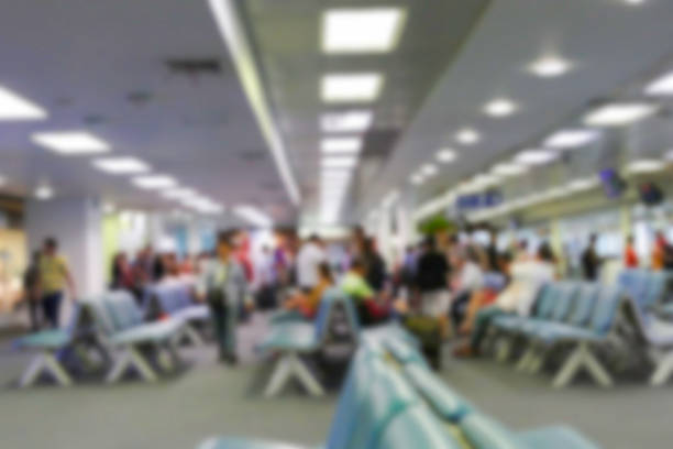 istock blurry defocused image of passenger at the airport 496690826