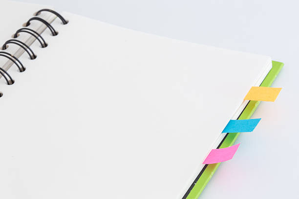 istock opened notebook with blank paper pages and color bookmarks 496700834