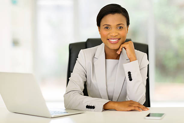 istock young african corporate worker sitting in office 496701254