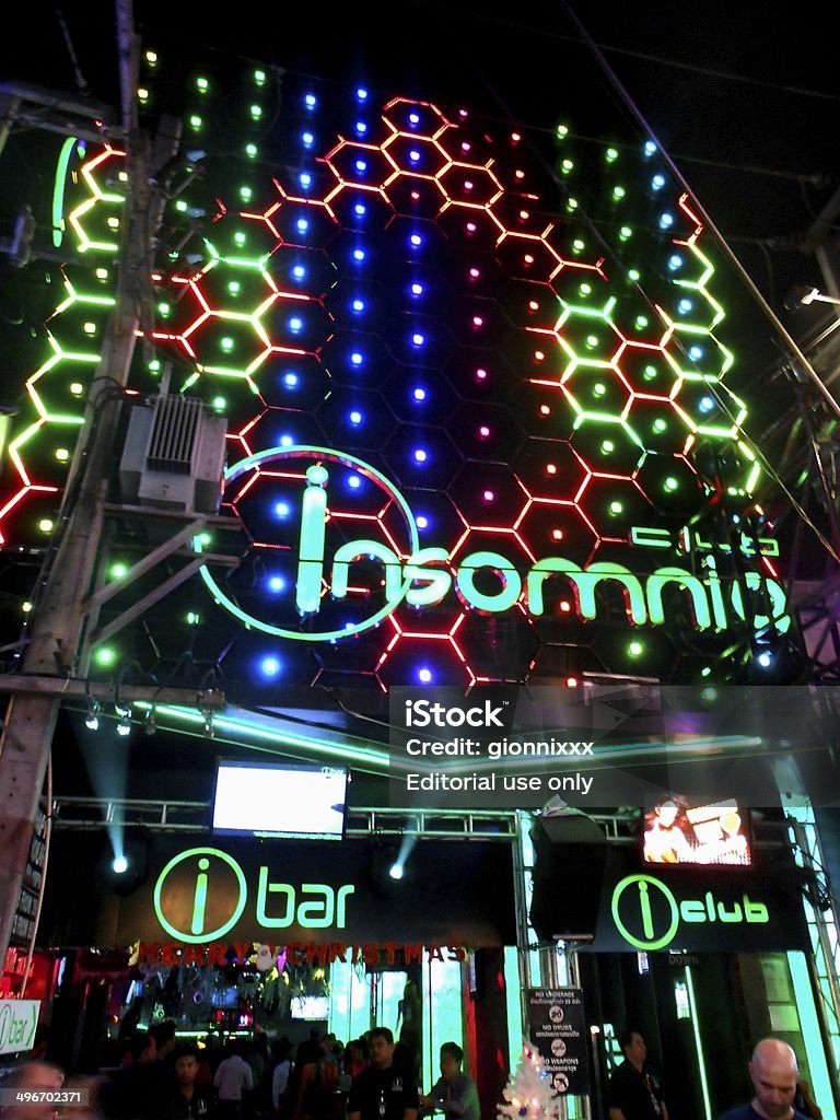 Pattaya nightclub Pattaya, Thailand - December 14, 2013: foreign men in front of a popular nightclub in Walking Street, the hottest nightlife spot in Pattaya Building Entrance Stock Photo