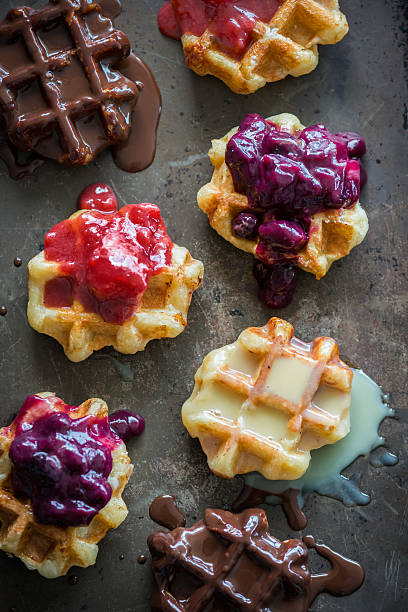 istock Mini Belgium Waffles Topped with Berry and Chocolate Sauces 496704186