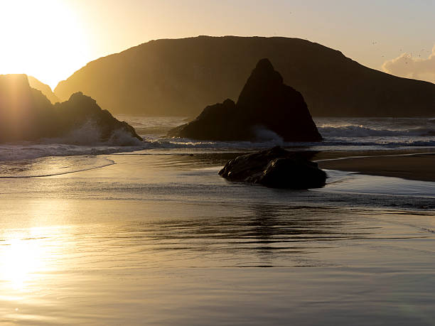 istock Sunset Colors on Rocks Harris Beach State Park Oregon 496704282