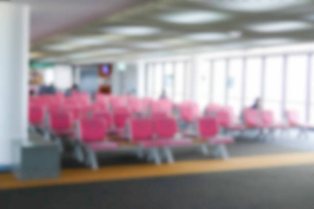 istock blurry defocused image of passenger at the airport terminal 496705020