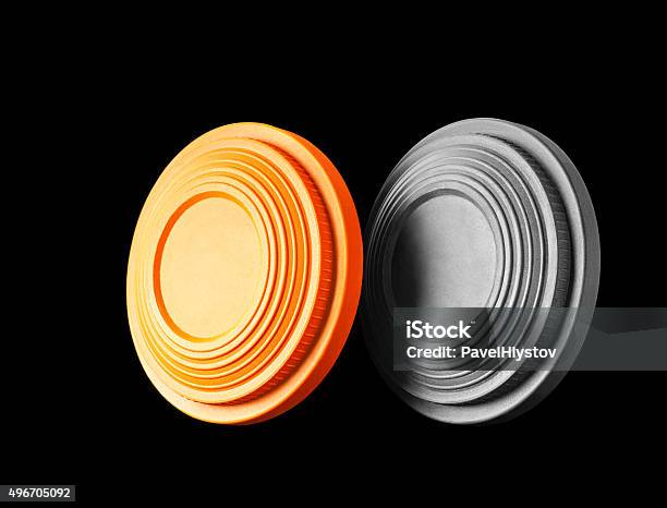 Closeup Of Two Clay Pigeon Targets Isolated On Black Background Stock Photo - Download Image Now